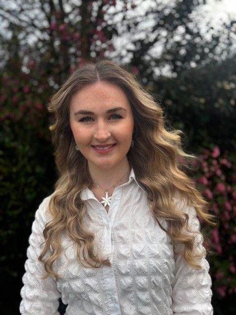 headshot of communications manager