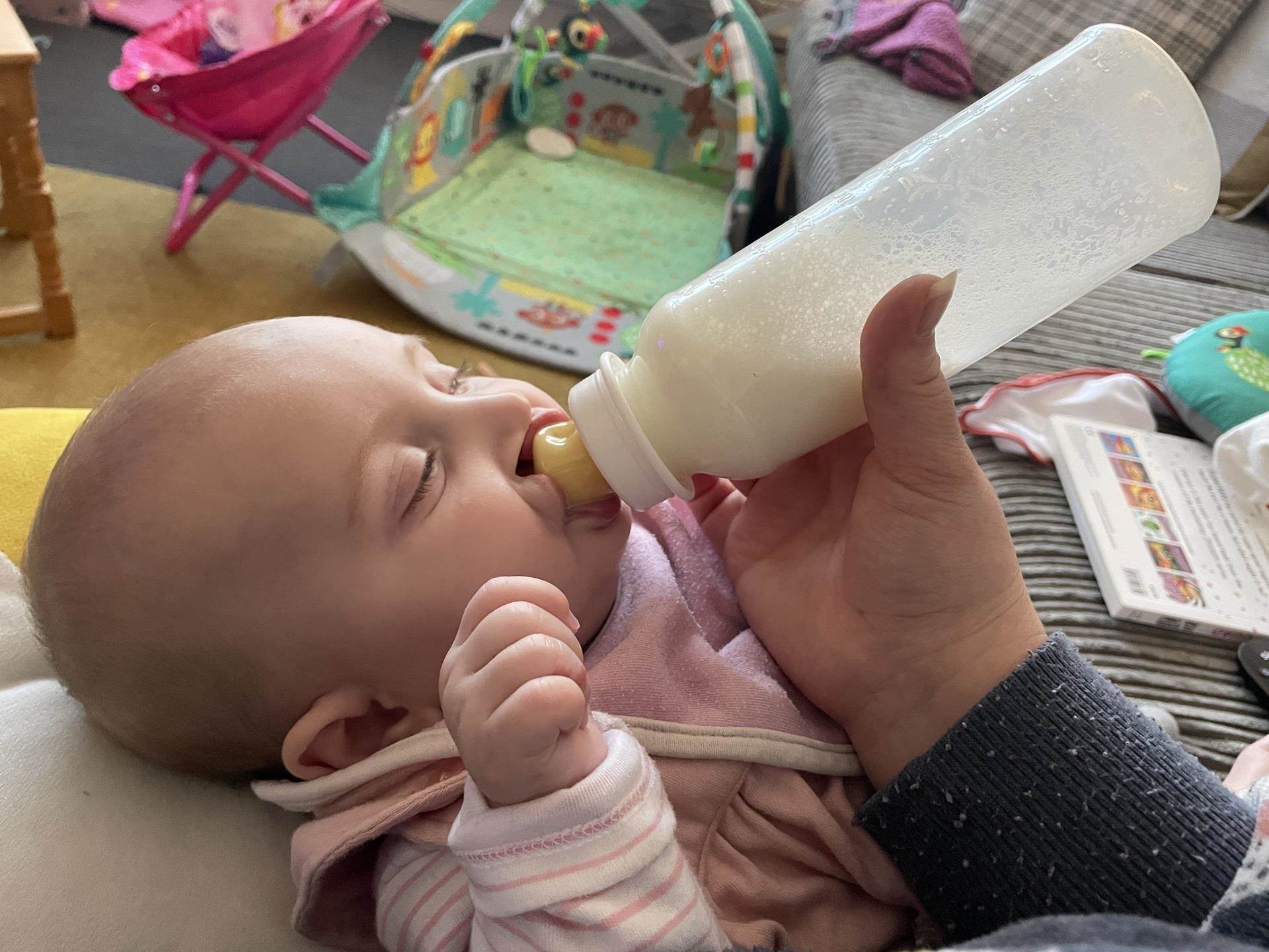 CLAPA feeding baby girl with speciality teat