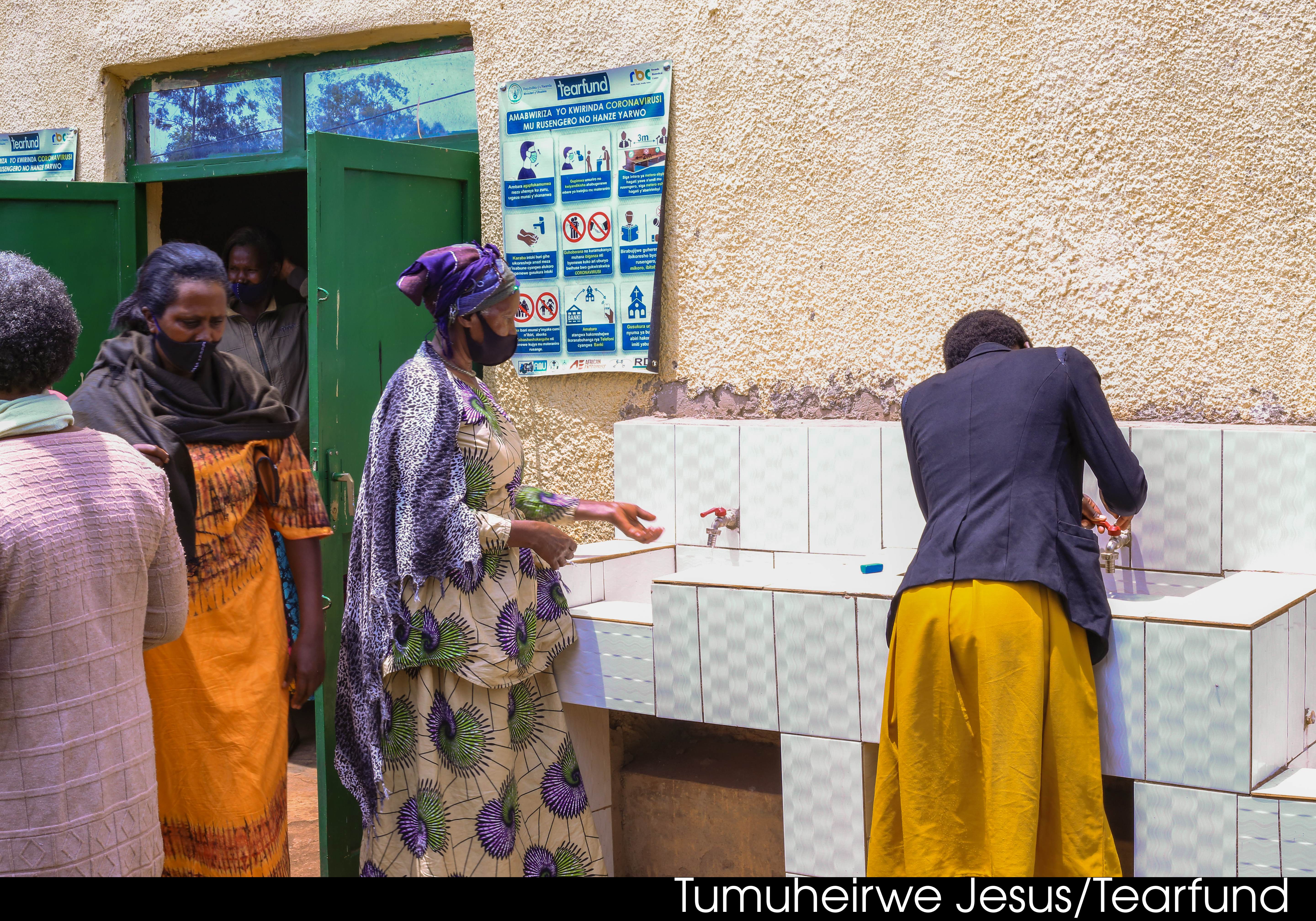 Women using clean water for Health and Sanitation Toilet Twinning