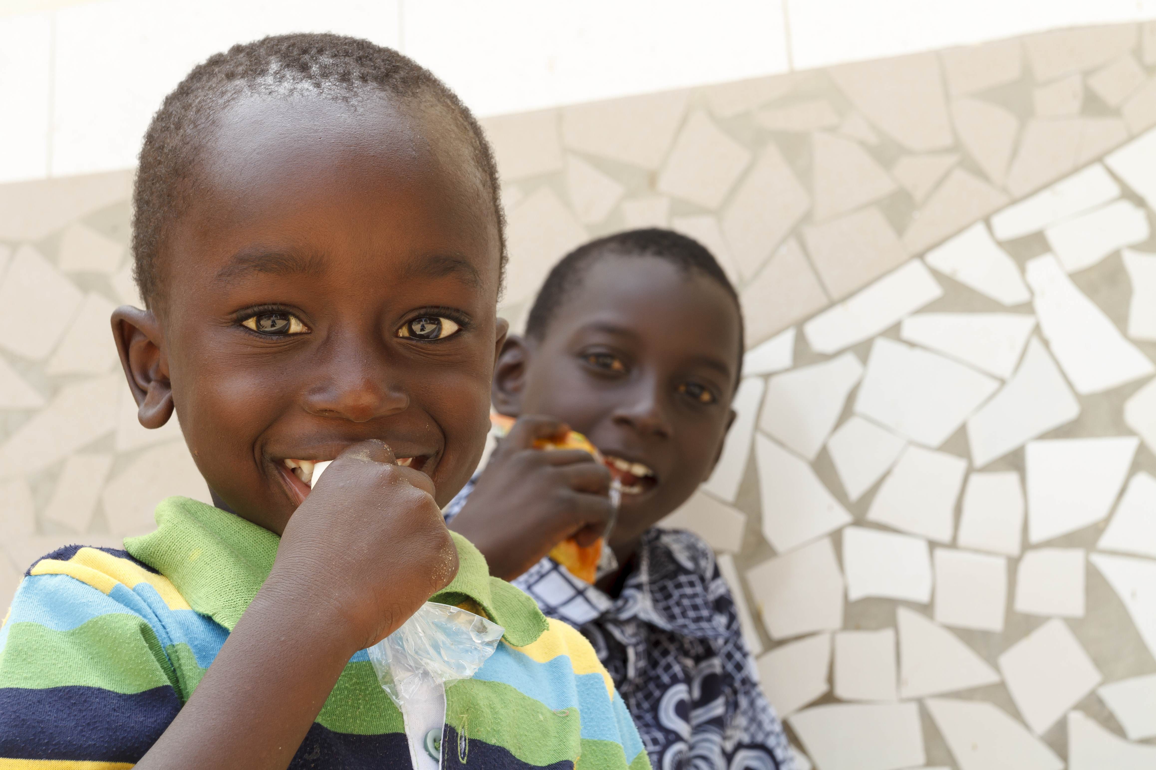 small child eating food to prevent hunger